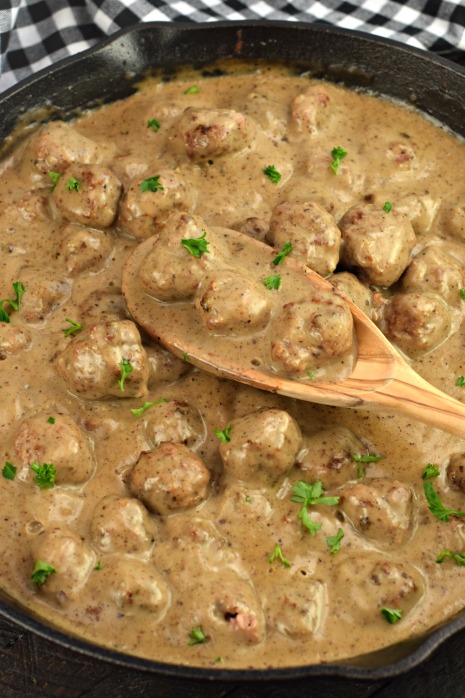 Swedish Meatballs in cast iron skillet with parsley
