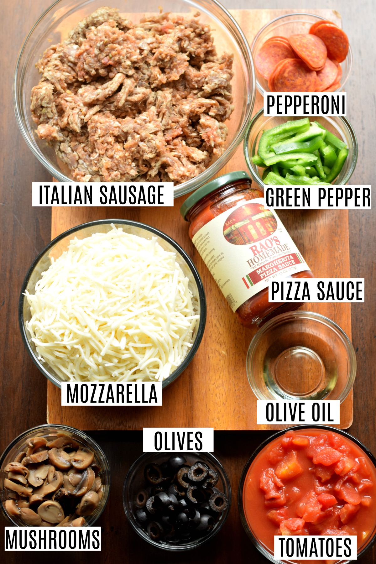 Ingredients needed to make crustless pizza casserole in a skillet.