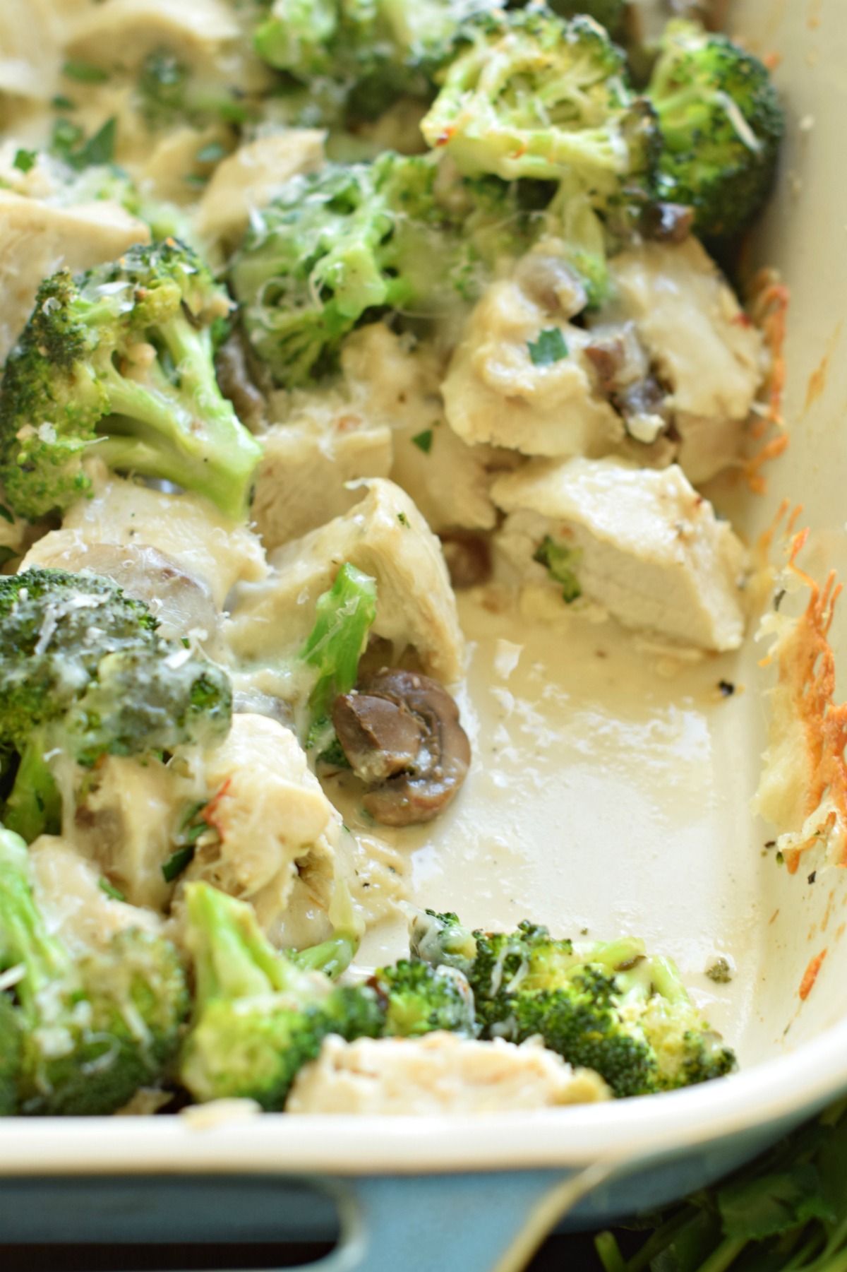 Chicken broccoli casserole with a scoop removed.