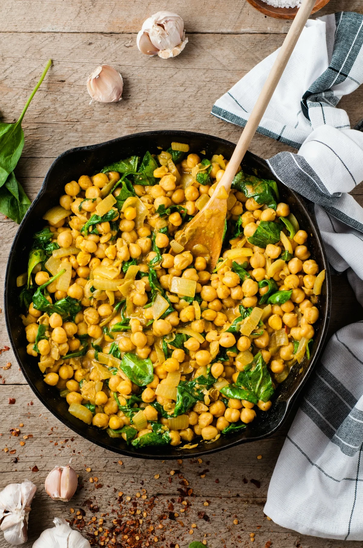 Fragrant and creamy Chickpea Curry is a vegetarian meal that comes together in under 30 minutes! Made with coconut milk and curry spices, this may become your new favorite weeknight meal.