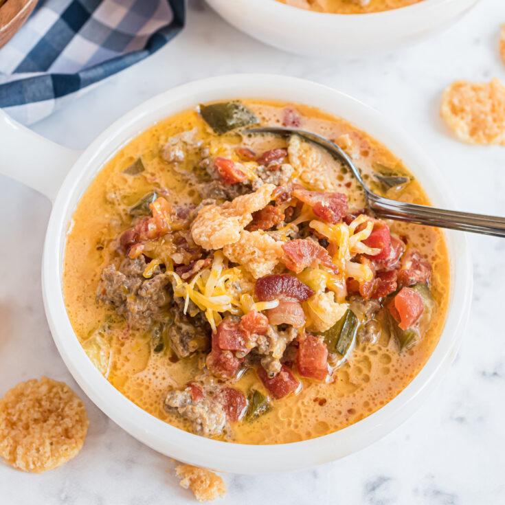 Hearty, creamy and flavorful, Cheeseburger Soup is the ideal soup for meat lovers! Skip the fast food burgers this weekend and make a big pot of soup from scratch instead. Don't forget the extra cheese on top!