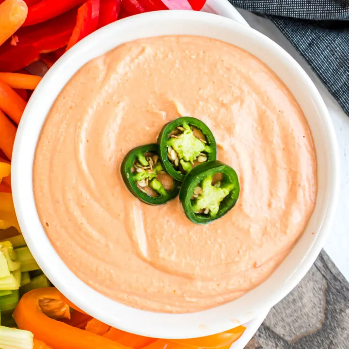 Cheesy creamy queso dip without the dairy? Yes, it's possible! This Vegan Cashew Queso recipe shines with taco spices and a velvety texture. Scoop it with vegetables or drizzle on your favorite Mexican dishes.