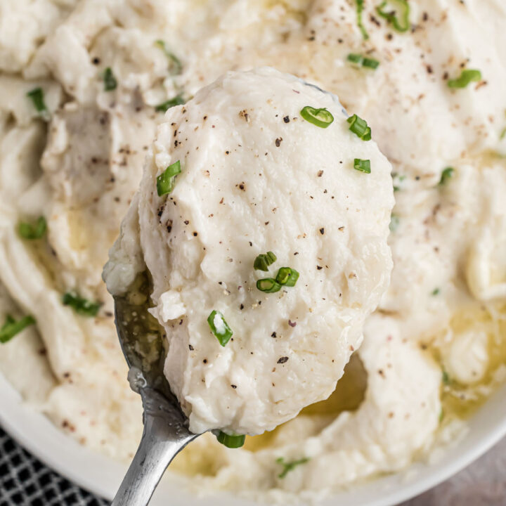 Move over potatoes, there's a new mashed veggie in town! Cauliflower Mash is pureed with garlic, cream cheese and Parmesan for an irresistible low carb side dish.