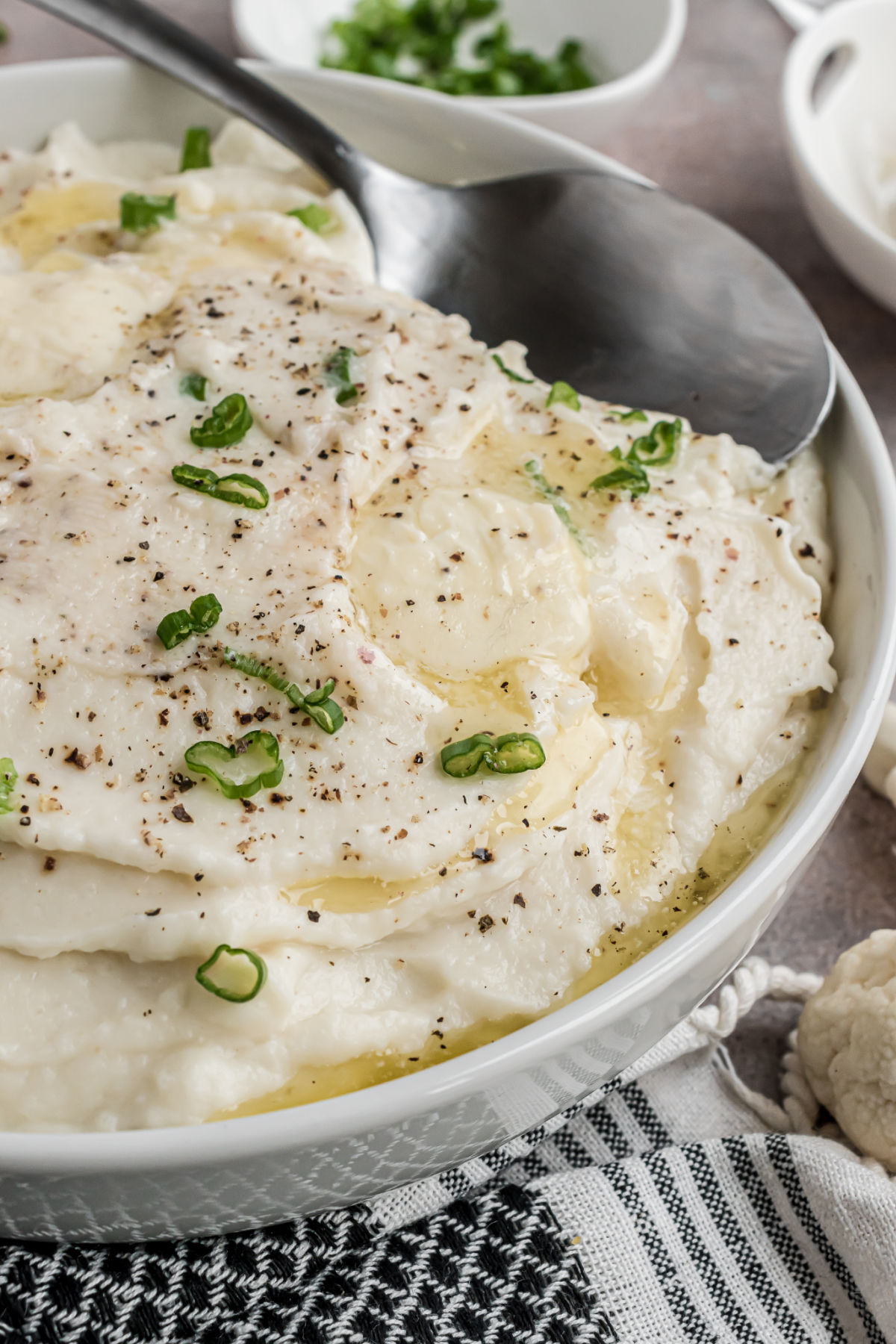 Mashed cauliflower with garlic, herbs, and butter.