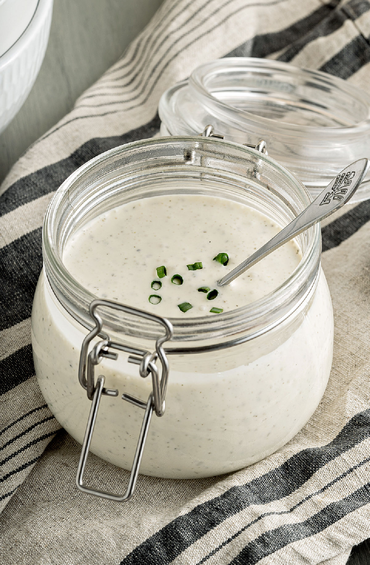 Homemade ranch dressing in mason jar with latch.
