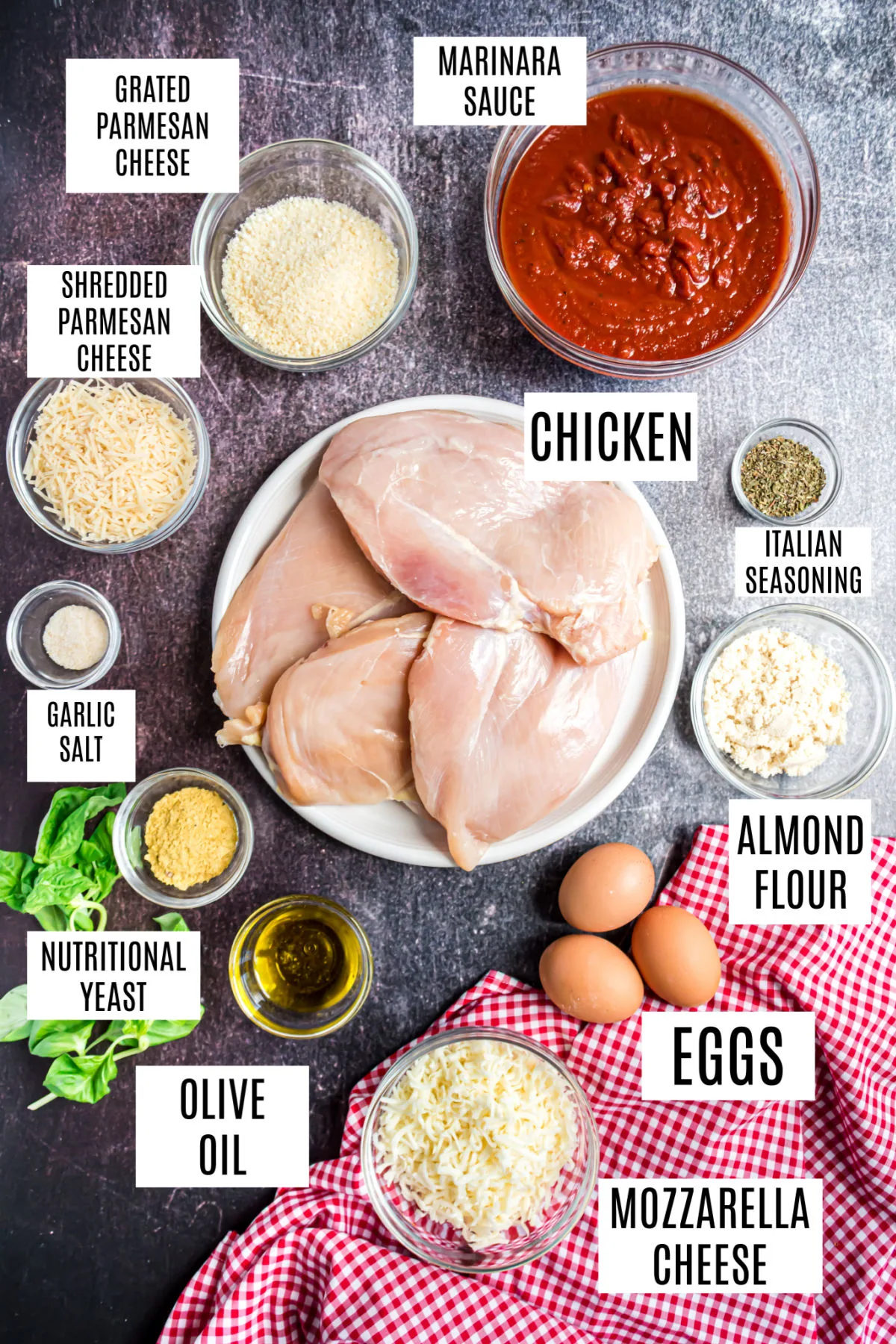 Ingredients needed to make gluten free chicken parmesan with almond flour.
