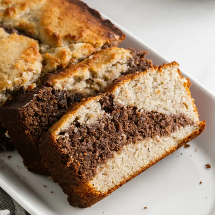 The best Sugar Free Banana Bread recipe you'll ever taste! This low carb banana bread is moist and sweet with a hint of chocolate. With no gluten or added sugar, this is a bread everyone can enjoy!
