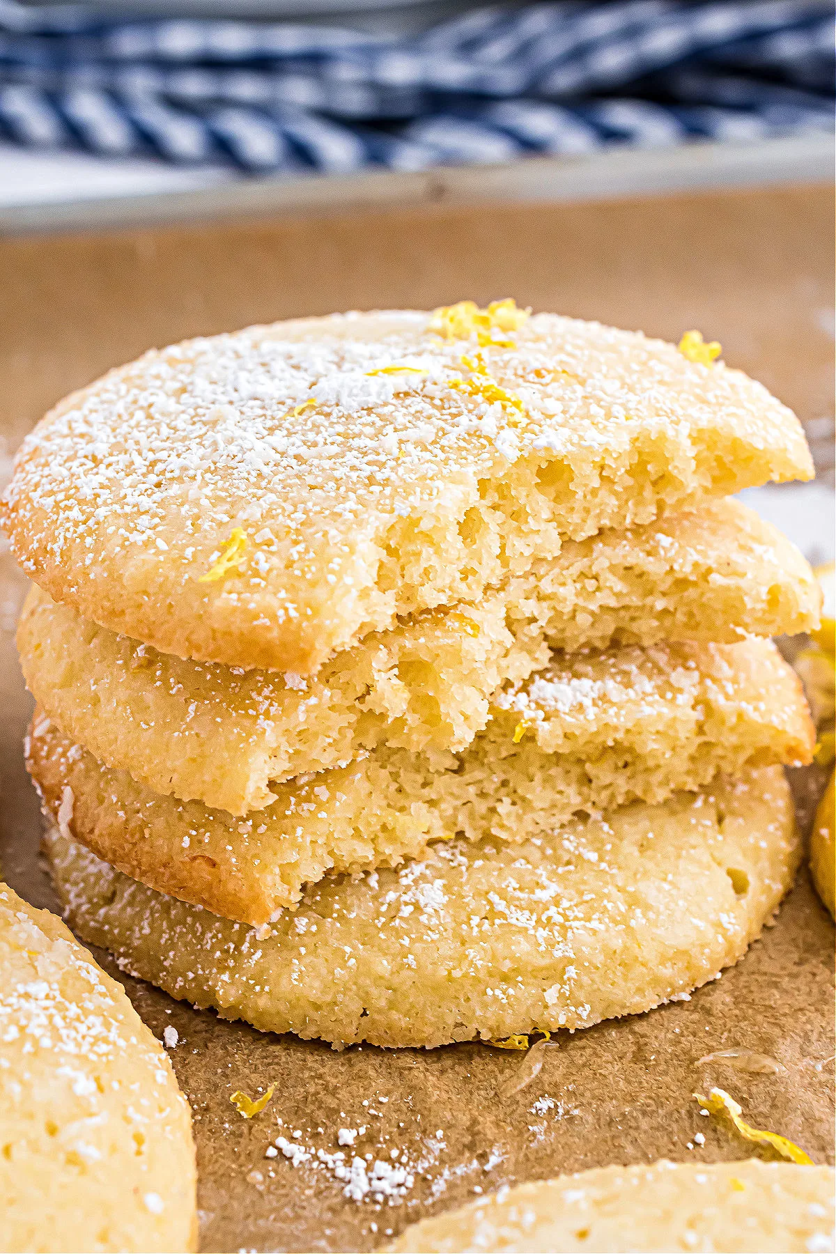 Stack of sugar free lemon cookies with bites removed.