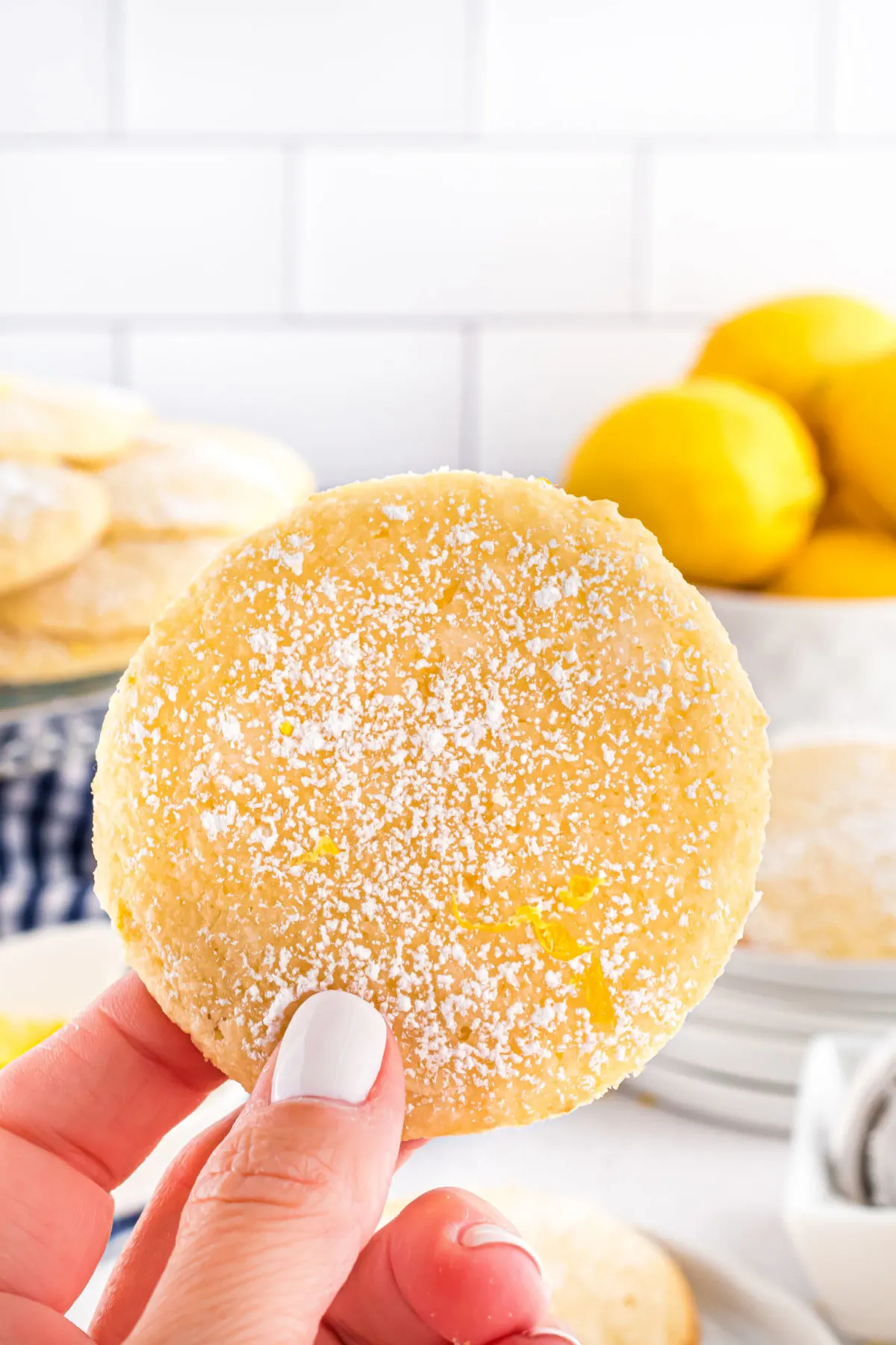 Gluten free lemon cookie dusted with powdered sugar.