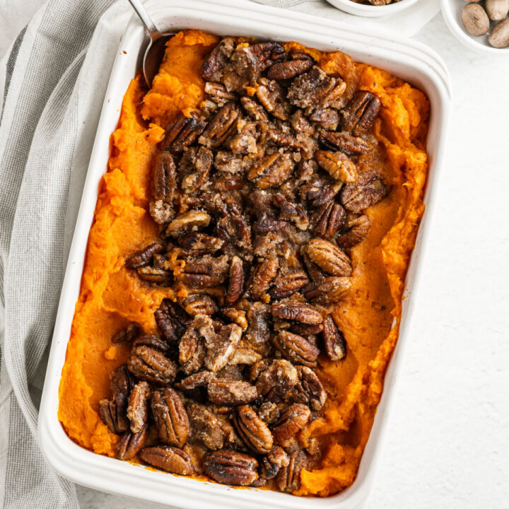 Looking for a Sweet Potato Casserole recipe with NO added sugar? We've got you covered. No one will miss the extra sugar in this healthier take on the classic Thanksgiving side dish. Mashed sweet potatoes with a nutty topping.