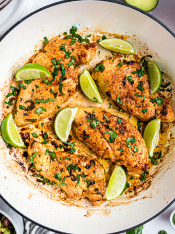 Cilantro lime chicken cooked in a large skillet.