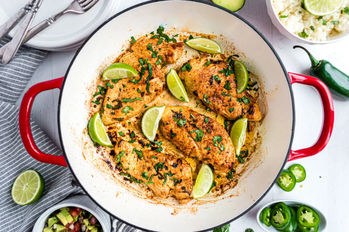Cilantro lime chicken cooked in a large skillet.