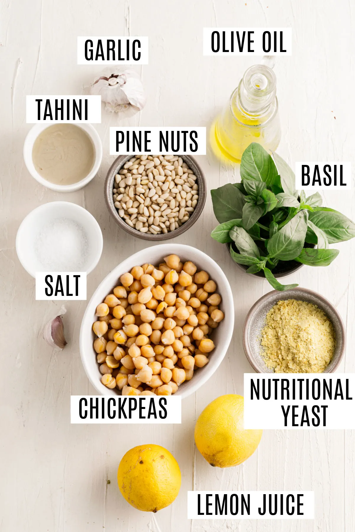 Ingredients needed to make pesto hummus.