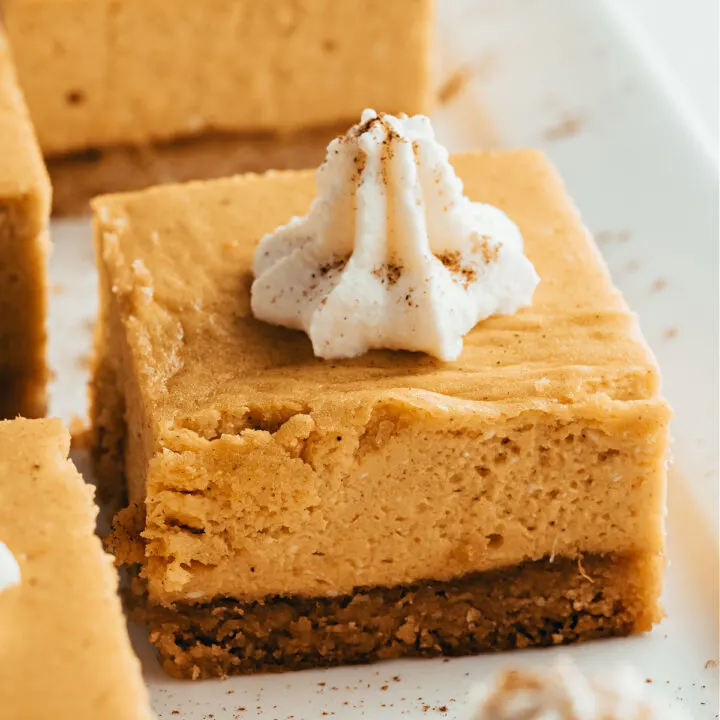 This Keto Pumpkin Cheesecake is sweet, creamy and full of pumpkin flavor! Low in carbs and free of refined sugar, you can feel good about serving this at your holiday gathering--or any time of year.
