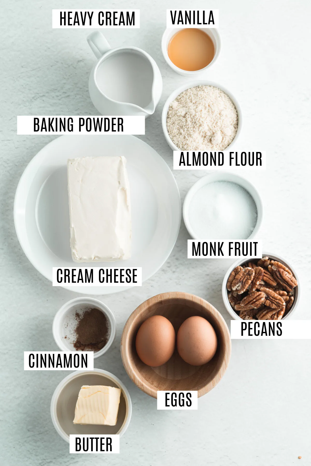 Ingredients needed to make sugar freem pecan pie cheesecake bars.