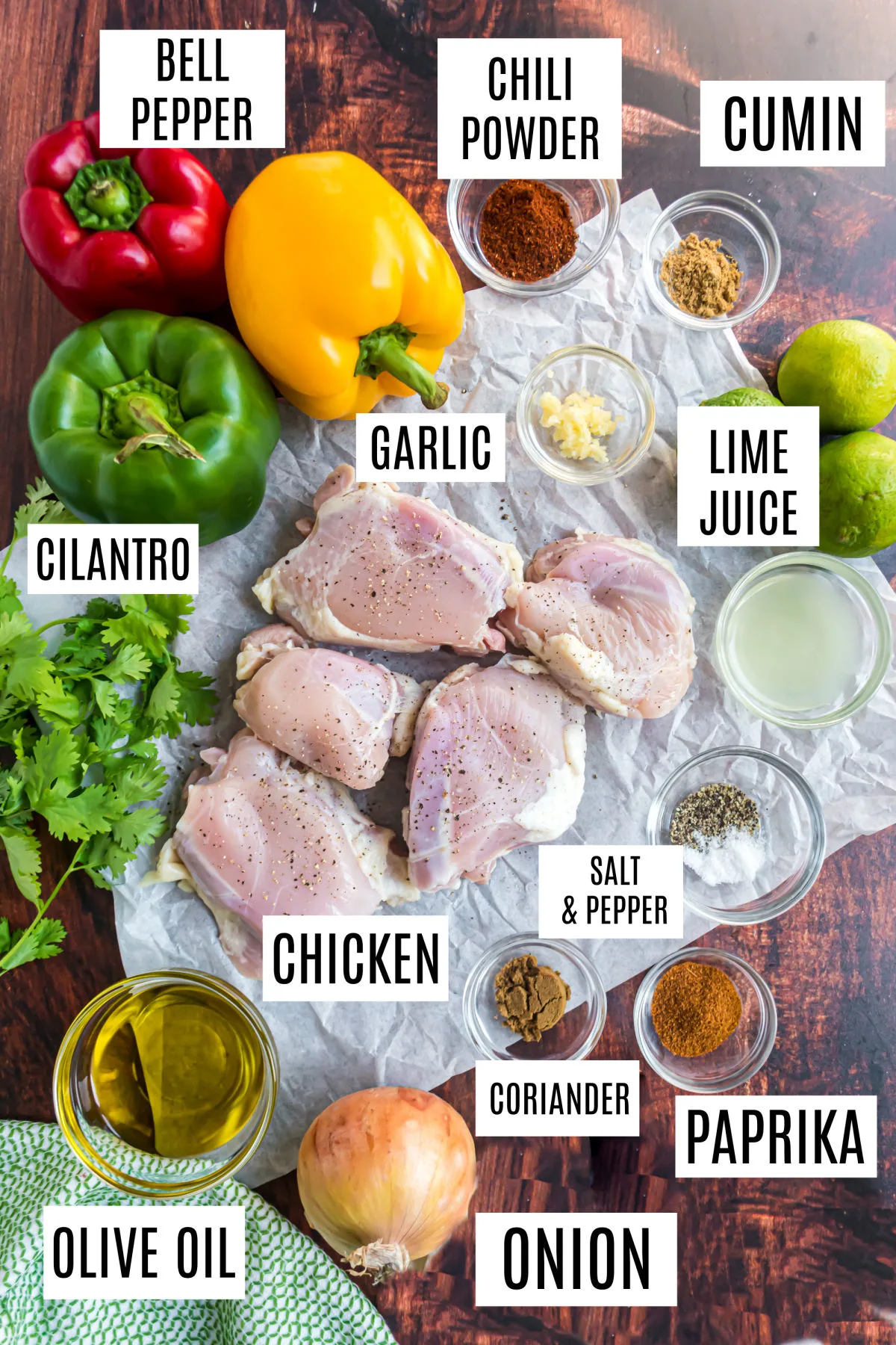 Ingredients needed to make sheet pan chicken fajitas.