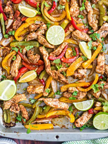Sheet Pan Chicken Fajitas are an easy weeknight meal the whole family loves. All you need is this fajita seasoning mix to turn chicken and peppers into delicious fajita bowls!