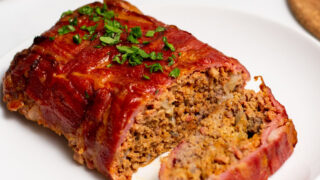 Meatloaf wrapped in a bacon weave and baked.