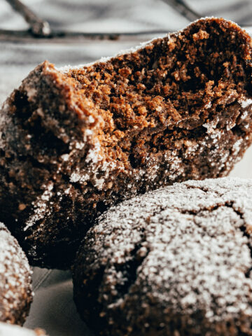 Keto Chocolate Crinkle Cookies have a gooey chocolate center and crisp edges. Powdered monk fruit gives the outside of the cookie a beautiful snow-dusted appearance. This is the perfect sugar-free cookie for Christmas!