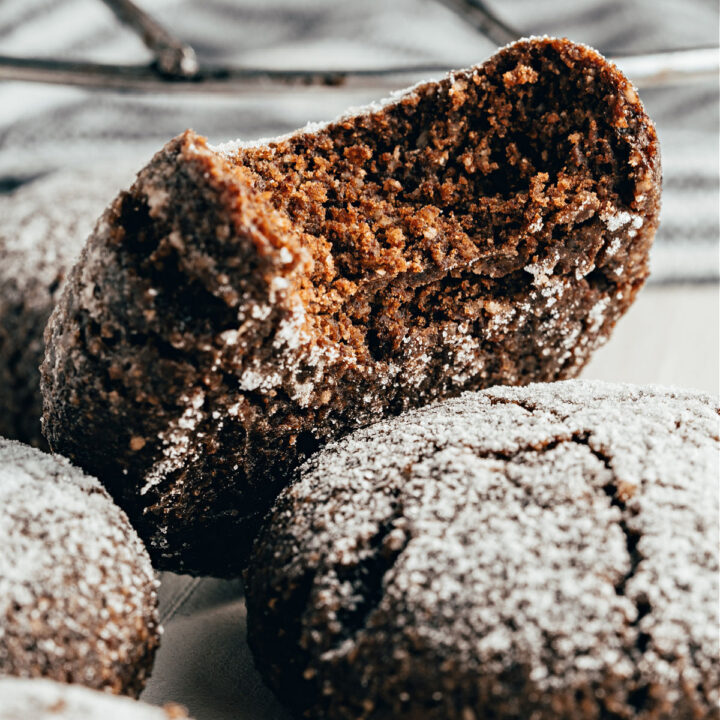 Keto Chocolate Crinkle Cookies have a gooey chocolate center and crisp edges. Powdered monk fruit gives the outside of the cookie a beautiful snow-dusted appearance. This is the perfect sugar-free cookie for Christmas!