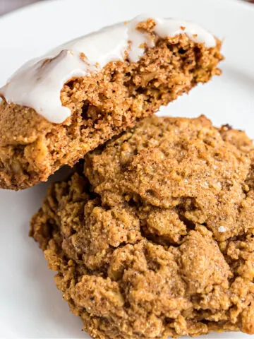 Healthy Pumpkin Cookies are a treat everyone can enjoy! These gluten free pumpkin cookies are topped with a sugar free glaze and packed with fall spices to create a delicious, chewy cookie recipe.