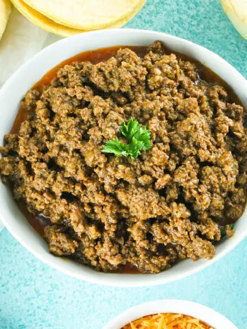Slow Cooker Taco Meat makes it easy to get a homecooked meal on the table any night of the week. It takes just 5 minutes of effort to have the best spiced beef for burrito bowls, salads and more.