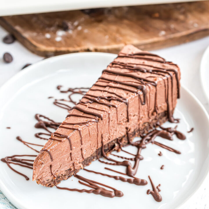 This Keto Chocolate Cheesecake has a homemade almond crust and luscious creamy chocolate filling. This no sugar, no bake cheesecake is easy to make for any occasion!