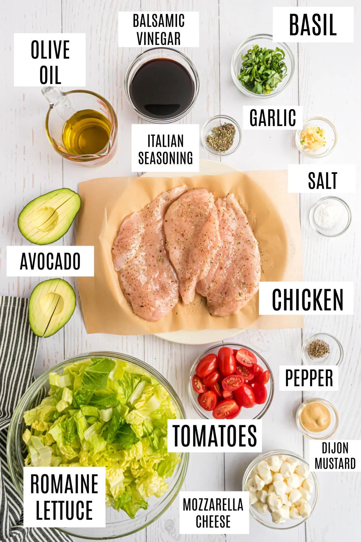 Ingredients needed to make chicken caperese salad.