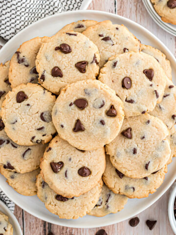 Gluten free shortbread cookies with a chocolate twist! Sugar Free Chocolate Chip Shortbread Cookies have a classic buttery taste with sweet chocolate morsels in every bite. You'll love this easy low carb recipe!