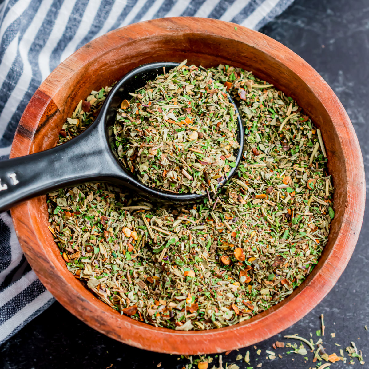 This Homemade Italian Seasoning mix adds instant herby flavor to any dish. Mix together this easy spice recipe to use in all of your favorite Italian dishes.