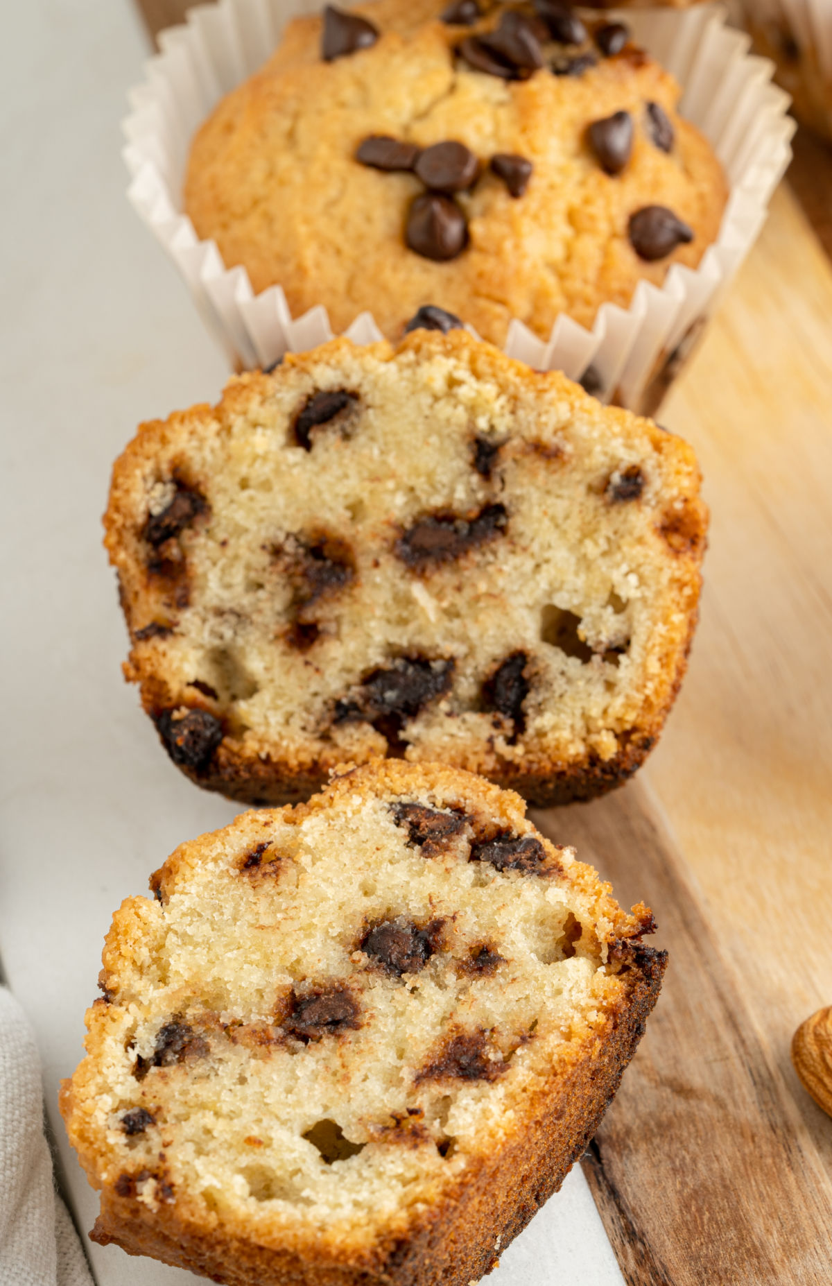 Chocolate chip muffins sliced in half.