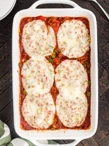 Baked and uncut sausage peppers casserole.