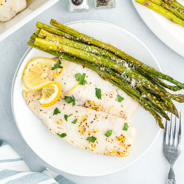 This Lemon Butter Tilapia is a restaurant quality dish made at home! A simple garlic and lemon sauce elevates fish filets to extraordinary heights of flavor and aroma. Ready in minutes, it's easy to make any night of the week but impressive enough for a special occasion!