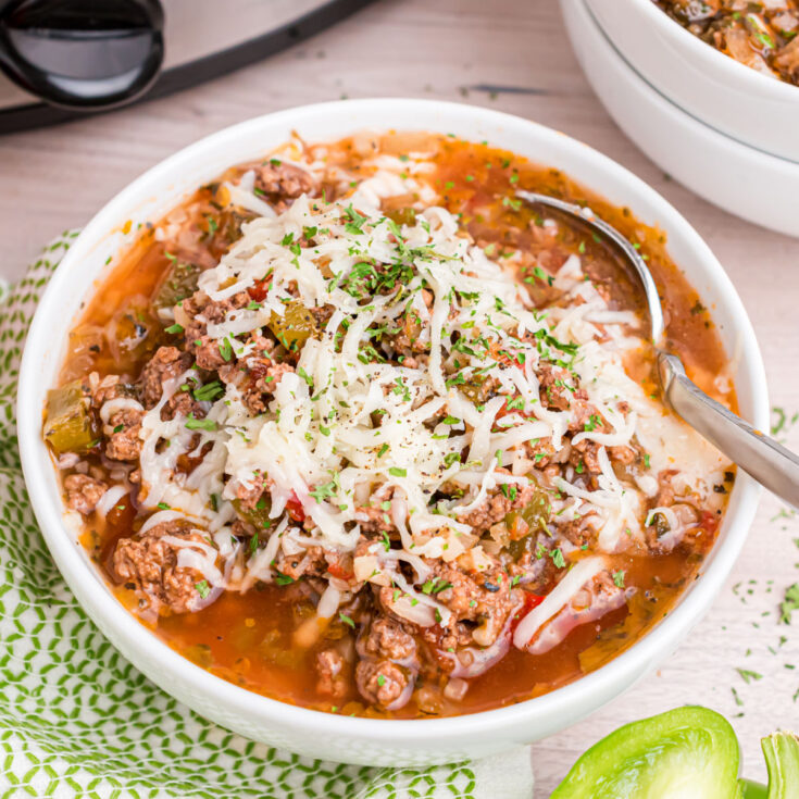 This Stuffed Pepper Soup features all the familiar meaty, cheesy flavor of stuffed peppers. Ground beef is seasoned with Italian herbs, then simmered for hours in a tangy tomato broth with peppers and onions. Can be made in slow cooker or stove top!
