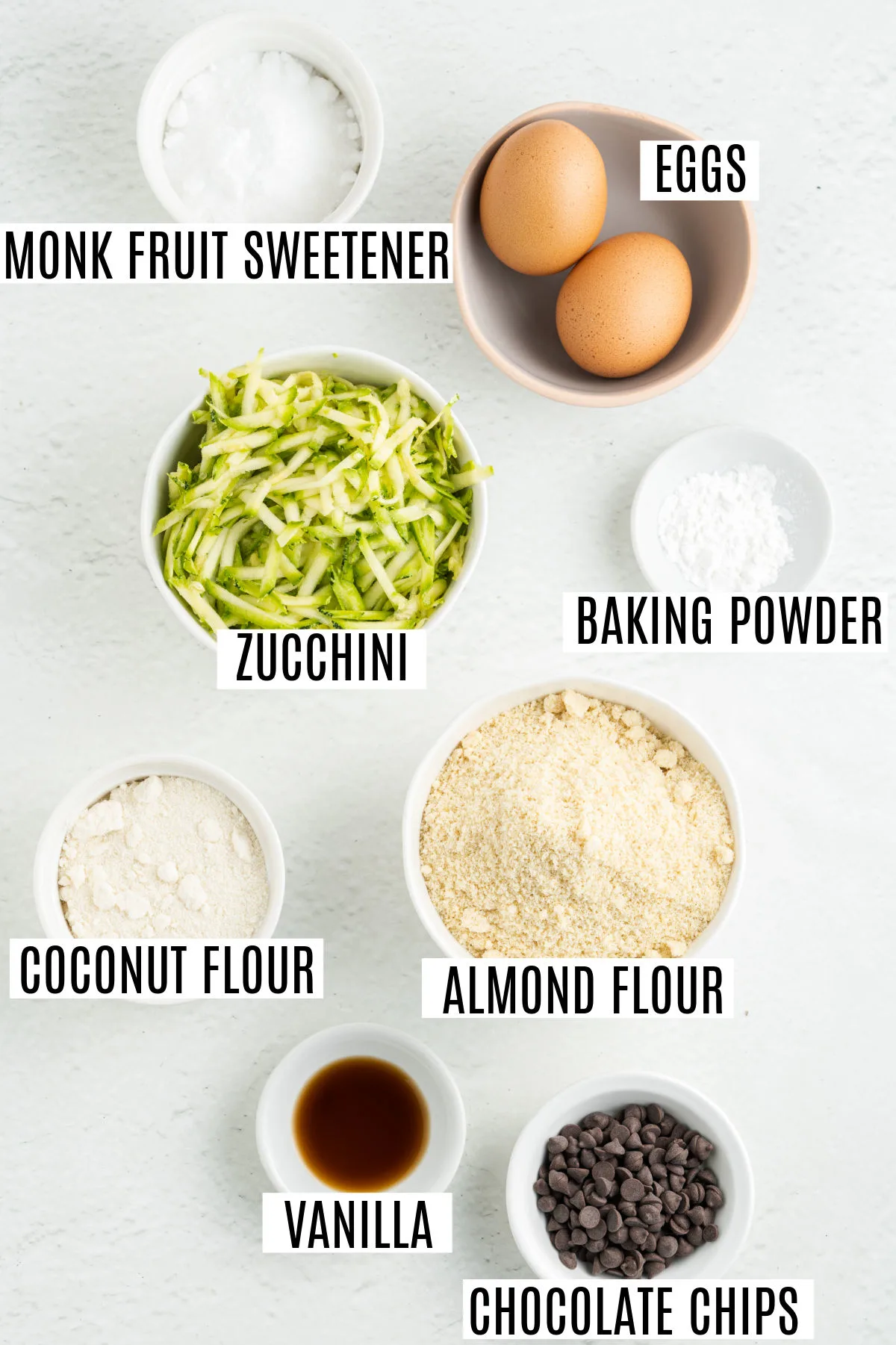 Ingredients needed to make chocolate chip zucchini cookies.