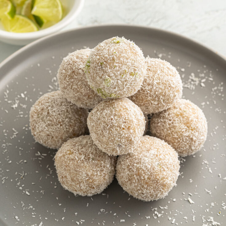Lime Coconut Energy Balls are healthy truffles with plenty of sweet zesty flavor. Walnuts, lime juice and coconut flakes come together to create delicious keto treats in this easy recipe.