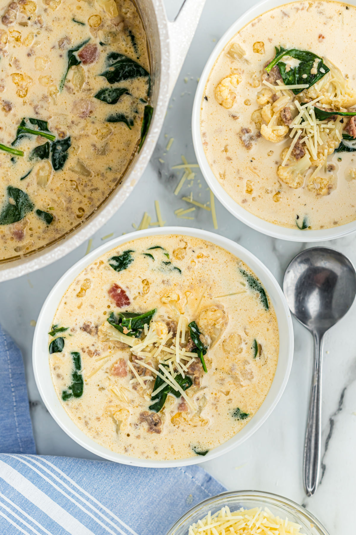 Low carb zuppa toscana soup served in white bowls.
