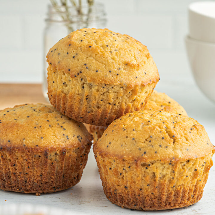 These Lemon Poppy Seed Muffins are moist, sweet and brimming with zesty lemon flavor. Enjoy the delicious taste of homemade muffins without the midmorning sugar crash!