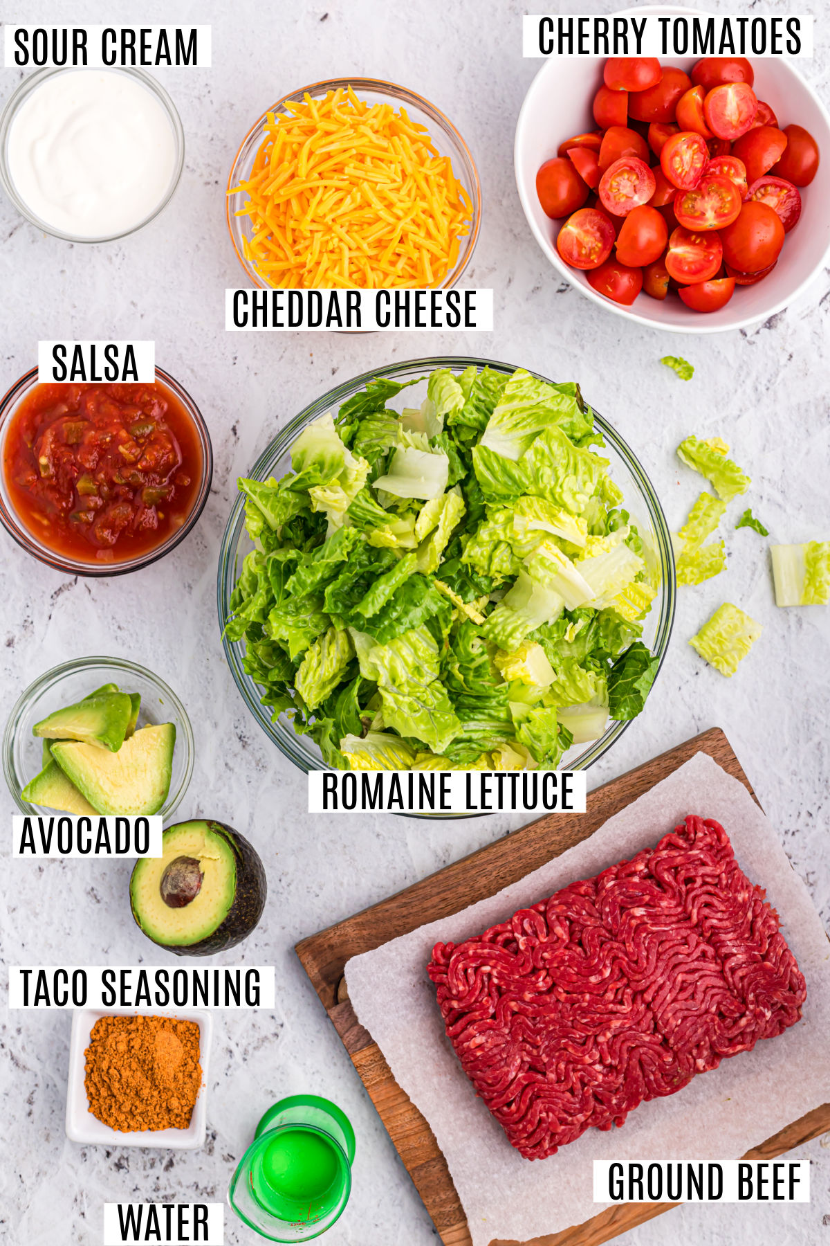 Ingredients needed to make taco salad.