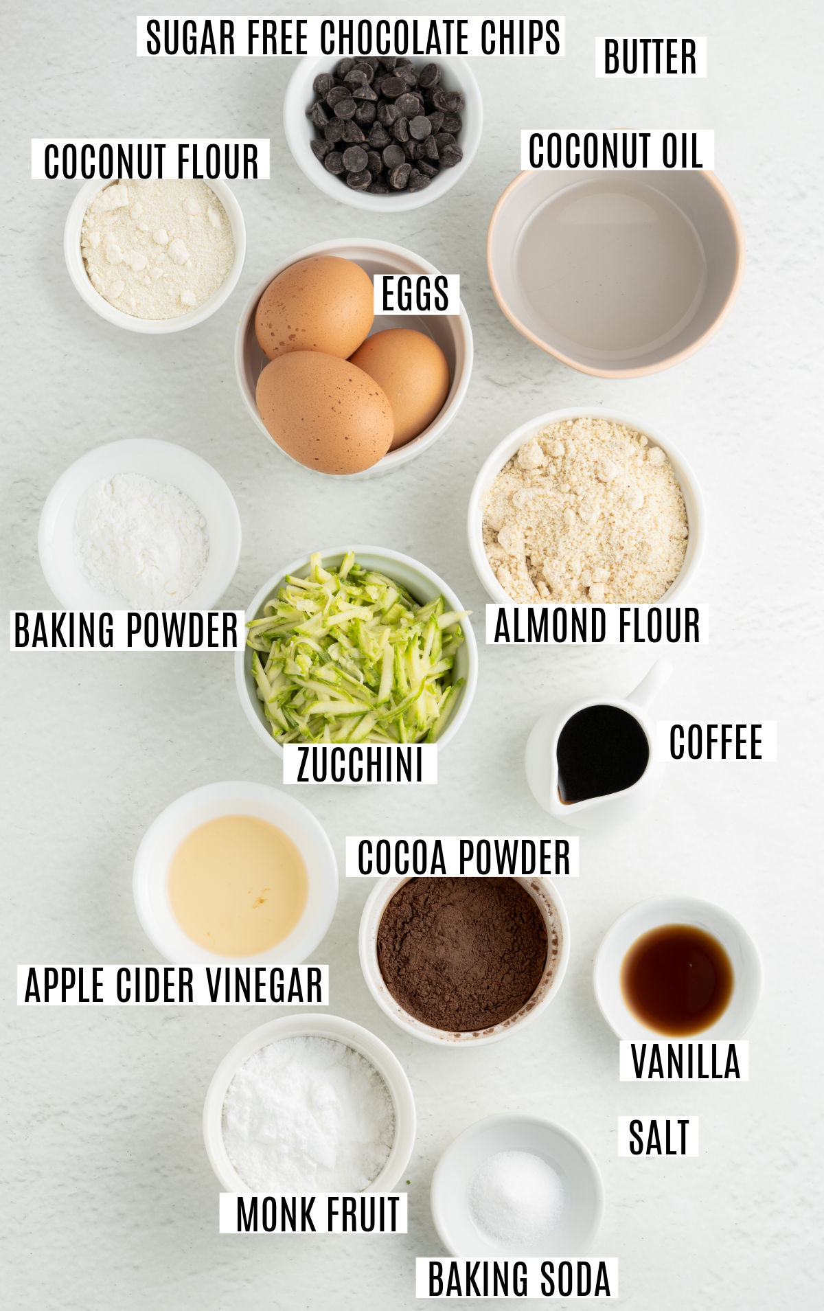 Ingredients needed to make chocolate zucchini bread.
