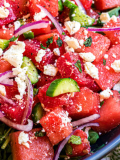 This Watermelon Salad recipe is made with feta, cucumber and a hint of mint in a zesty lime dressing! A refreshing and flavorful addition to any summer dinner table you can make in minutes.