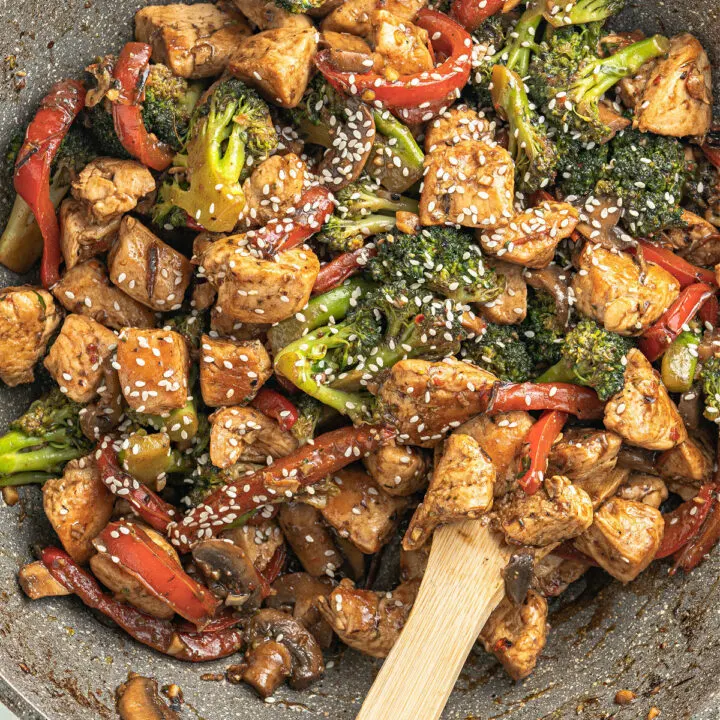 Chicken Stir Fry is an easy, tasty and healthy dinner idea for any night of the week! Succulent chicken, tender veggies and a no-sugar stir-fry sauce come together in this lighting quick recipe.