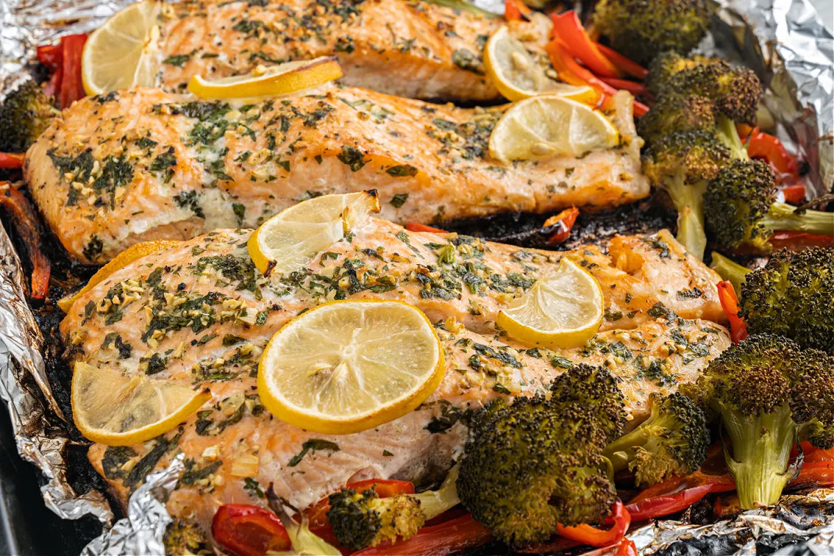 Sheet pan with salmon and vegetables.