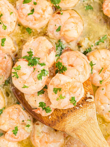 Garlic Butter Shrimp is a healthy, flavorful 15 minute seafood recipe. Shrimp is skillet cooked, then perfectly seasoned with garlic, lemon and a hint of spice for an easy and tasty dinner.