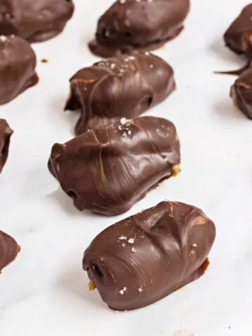 Satisfy your sweet tooth with these healthy Chocolate Dates! Made with just five ingredients and no added sugar, this peanut butter stuffed dates recipe couldn't be any easier.