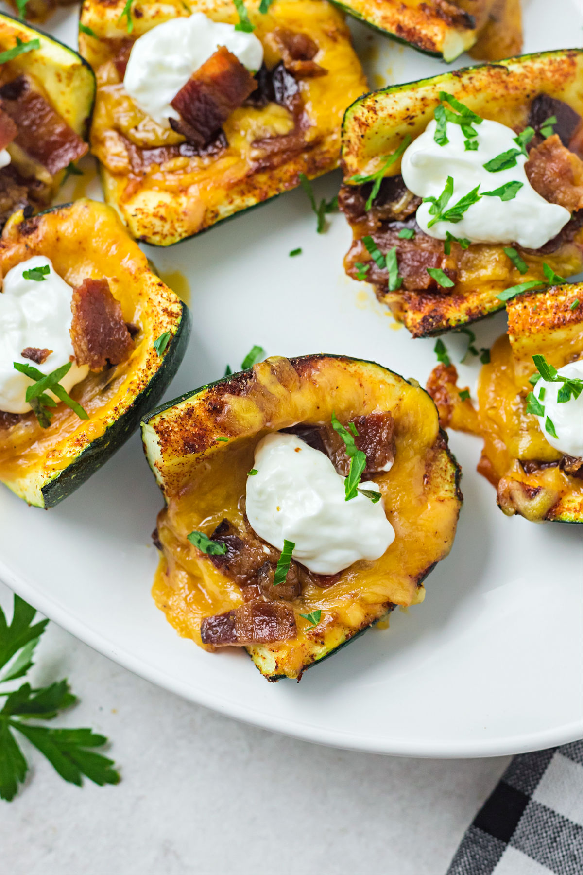 Loaded zucchini skins with bacon, cheese, and sour cream.